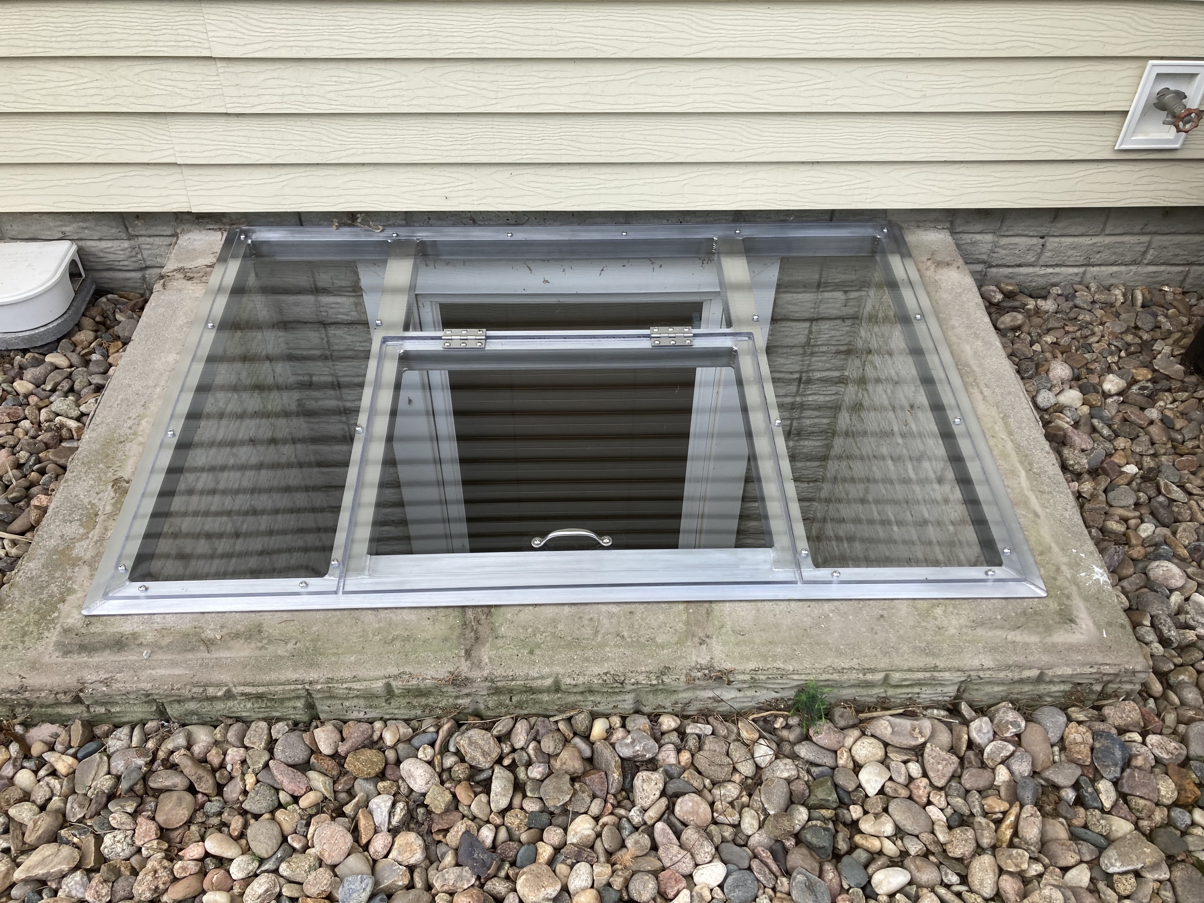 Aluminum egress window cover